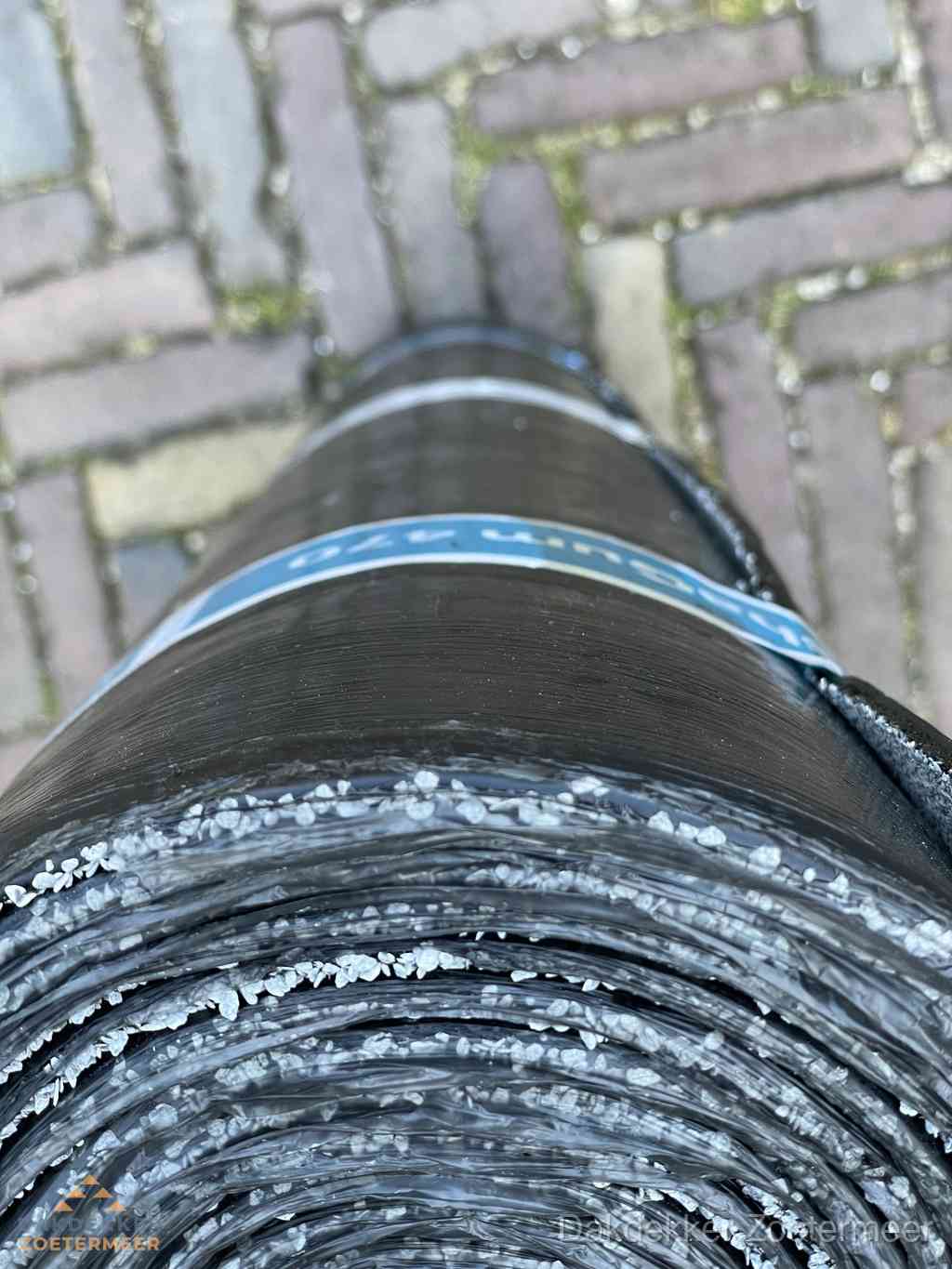 Rol bitumen dakleer met leislag voor plat dak in Zoetermeer